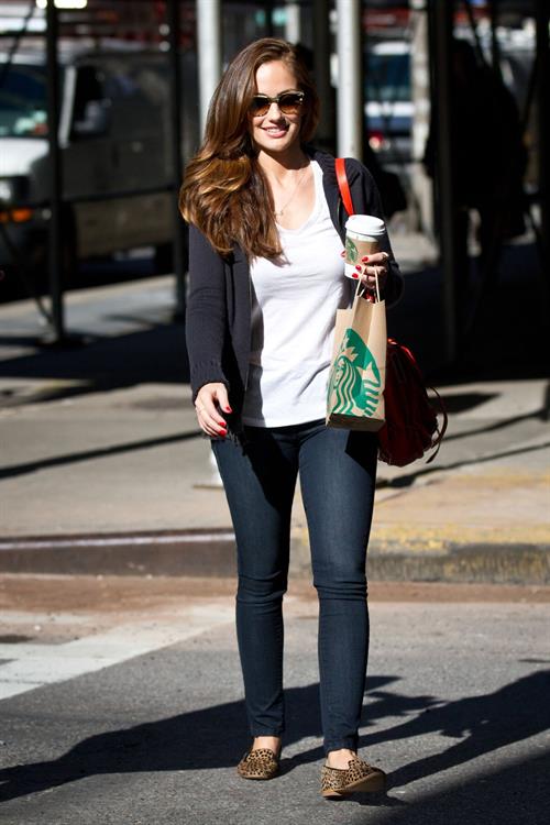Minka Kelly outside her hotel with her morning Starbucks in New York City 8/2/2012 