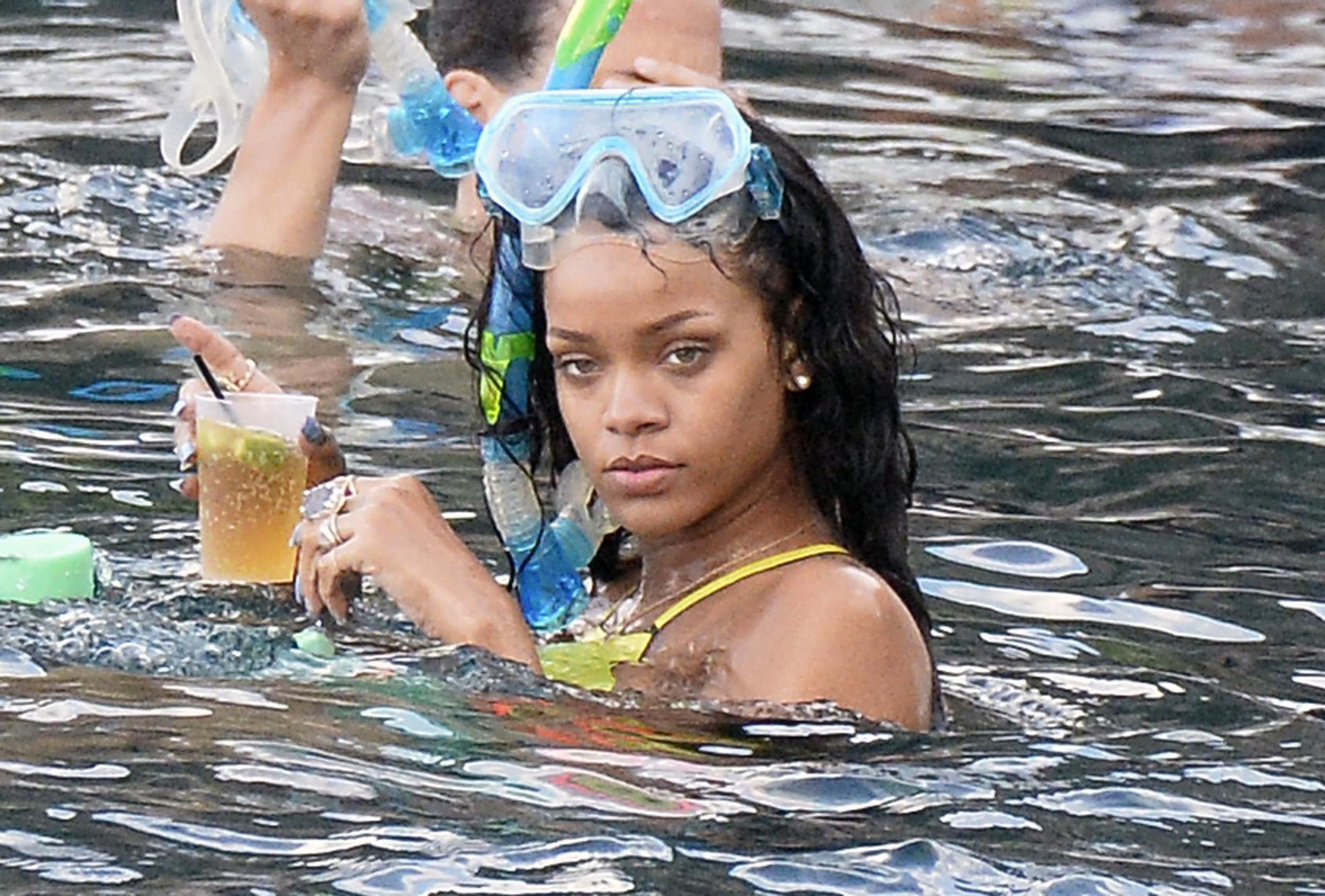 Rihanna enjoying a break on a yacht in Ponza August 29, 2014