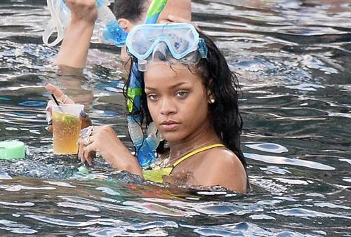 Rihanna Bikini Pictures Rihanna enjoying a break on a yacht in Ponza August 29, 2014