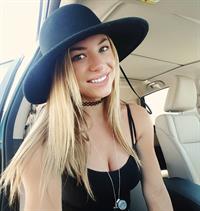 Nikki Leigh taking a selfie