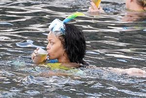 Rihanna enjoying a break on a yacht in Ponza August 29, 2014