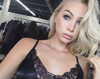 Taylor Godfrey in lingerie taking a selfie