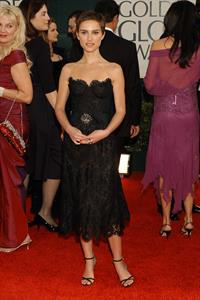 Natalie Portman with short hair and a black dress at the Golden Global Awards