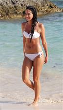 Tulisa Contostavlos in a bikini on the beach in Bermuda August 21, 2014