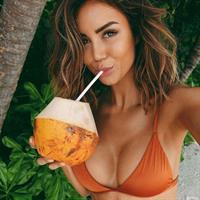 Pia Muehlenbeck in a bikini taking a selfie