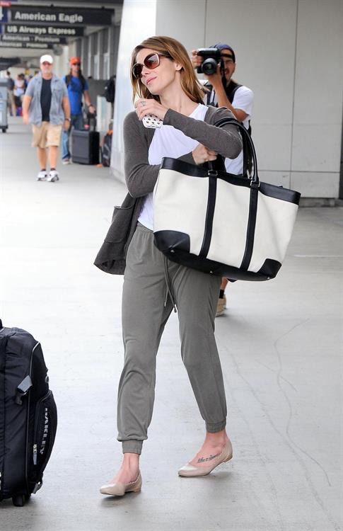Ashley Greene arriving at LAX August 22, 2014