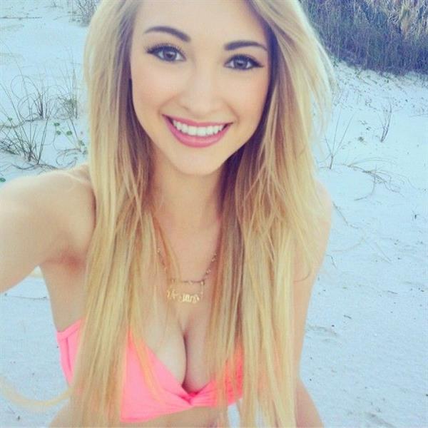 Anna Faith Carlson in a bikini taking a selfie