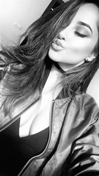 Becky G taking a selfie