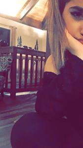 Becky G taking a selfie