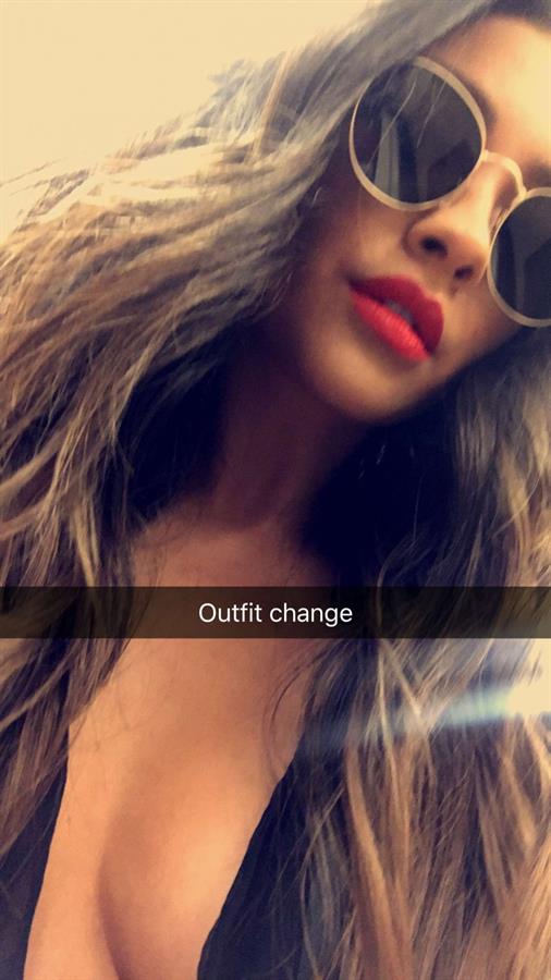 Shay Mitchell taking a selfie