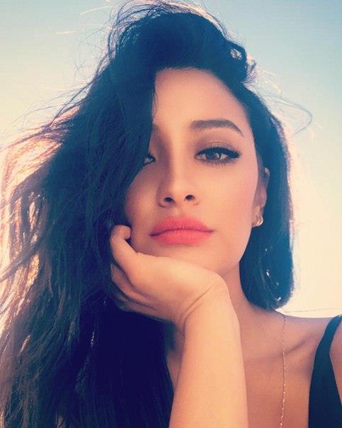 Shay Mitchell taking a selfie