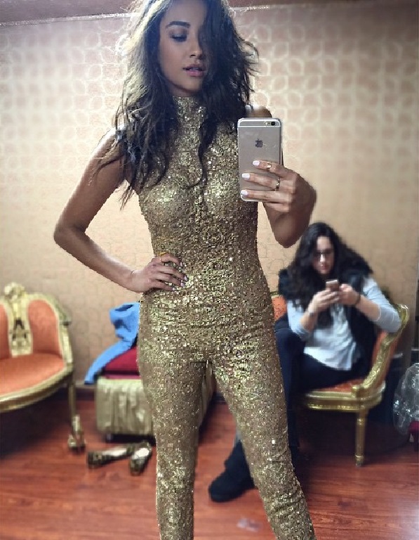 Shay Mitchell taking a selfie