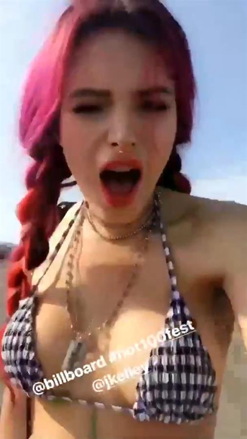 Bella Thorne in a bikini taking a selfie