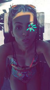 Victoria Justice in a bikini taking a selfie