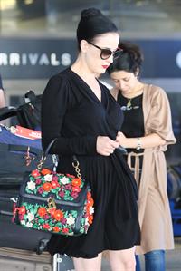 Dita Von Teese arrives from a flight at LAX August 20, 2014