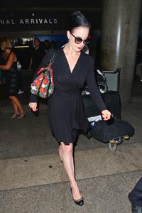 Dita Von Teese arrives from a flight at LAX August 20, 2014
