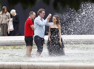 Natalie Portman modeling for a Miss Dior campaign photo shoot in the gardens of the Palais Royal in Paris 6/26/12 