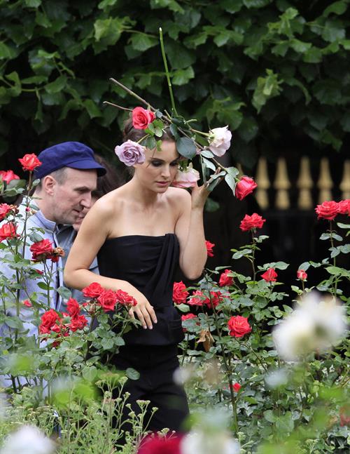 Natalie Portman modeling for a Miss Dior campaign photo shoot in the gardens of the Palais Royal in Paris 6/26/12 
