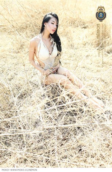 Jin Mei Xin in a bikini