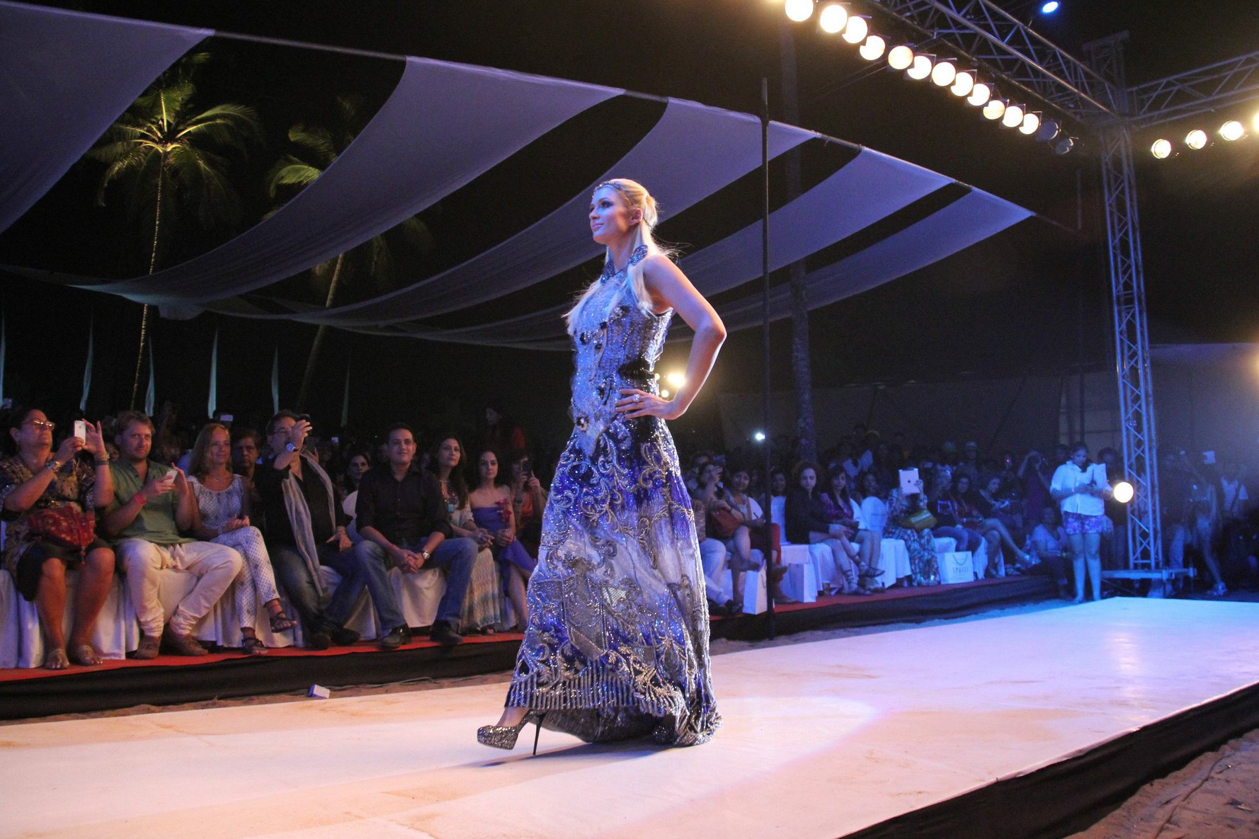 Paris Hilton Pictures Paris Hilton walks for designer duo Shane and Falguni Peacock and performs as a DJ at the India Resort Fashion Week