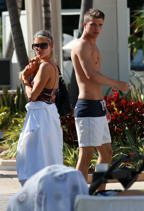 Paris Hilton poolside at their Miami hotel December 7-2012 