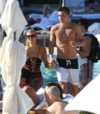 Paris Hilton poolside at their Miami hotel December 7-2012 