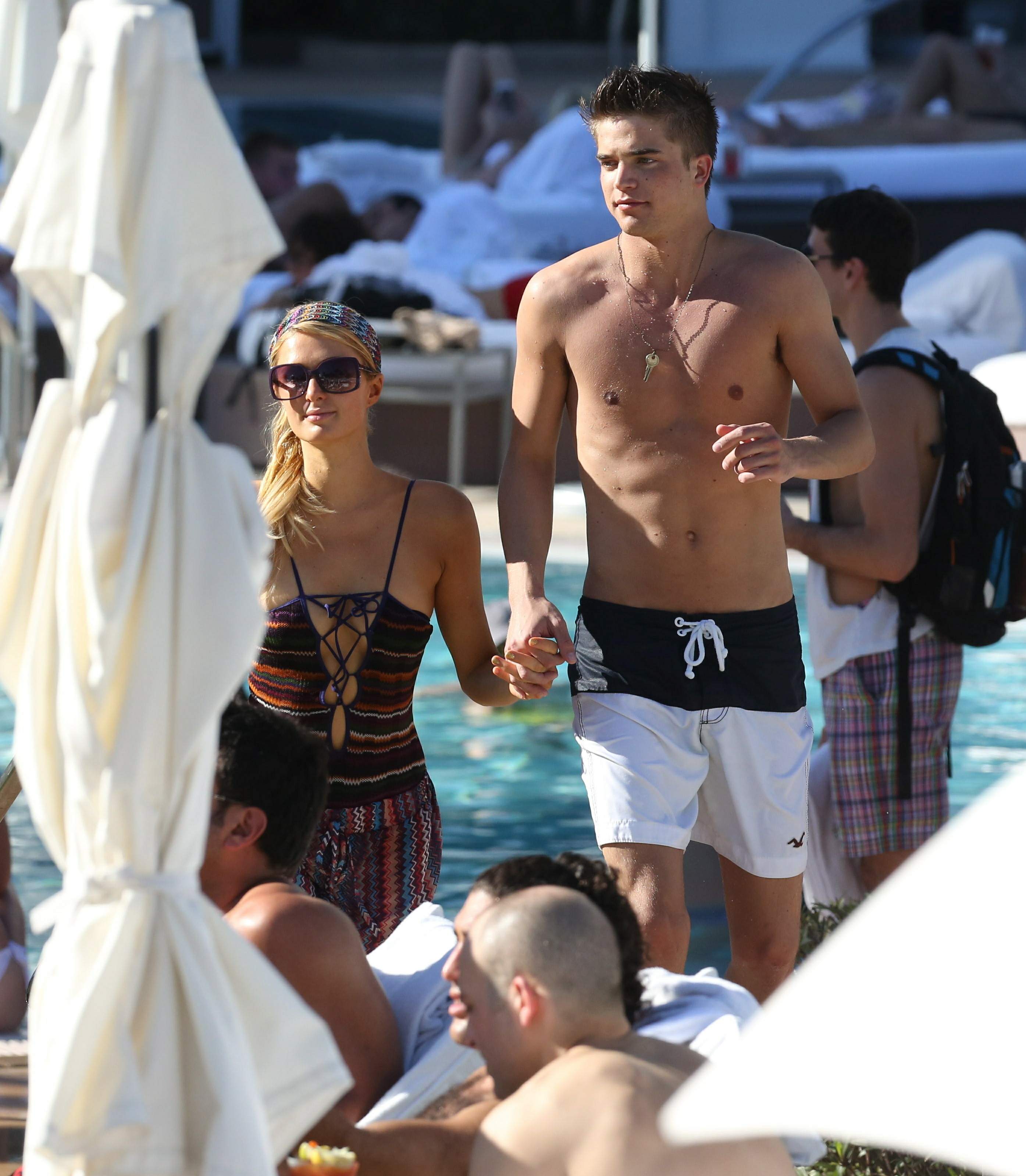 Paris Hilton poolside at their Miami hotel December 7-2012 