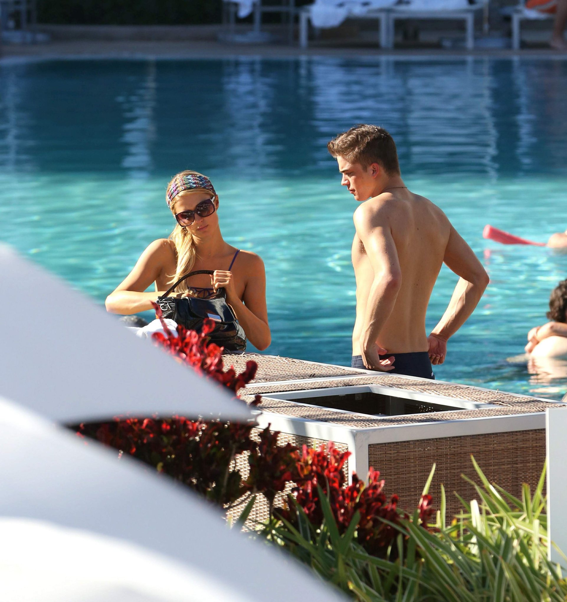 Paris Hilton poolside at their Miami hotel December 7-2012 