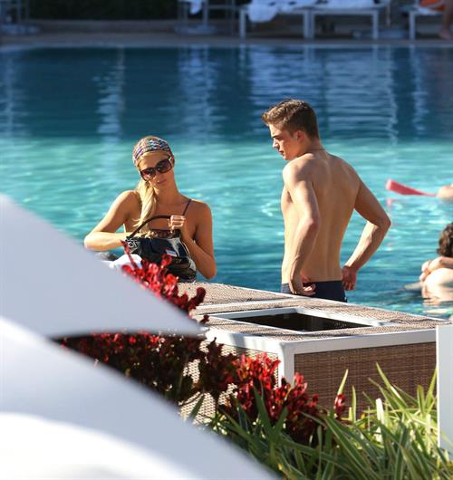 Paris Hilton poolside at their Miami hotel December 7-2012 