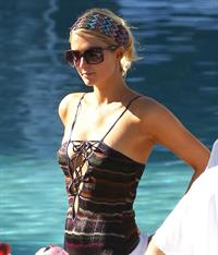Paris Hilton poolside at their Miami hotel December 7-2012 