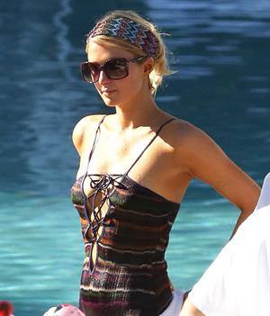 Paris Hilton poolside at their Miami hotel December 7-2012 