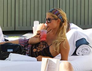 Paris Hilton poolside at their Miami hotel December 7-2012 