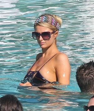 Paris Hilton poolside at their Miami hotel December 7-2012 