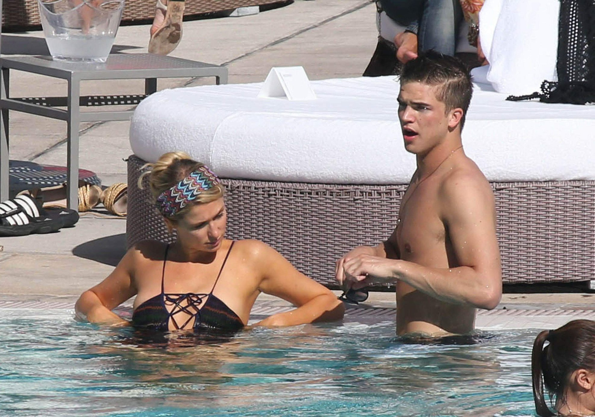 Paris Hilton poolside at their Miami hotel December 7-2012 