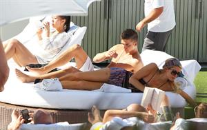 Paris Hilton poolside at their Miami hotel December 7-2012 