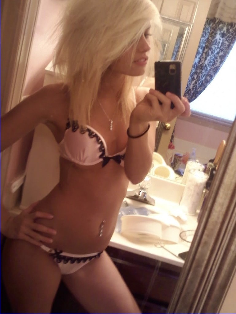 Anonymous in lingerie taking a selfie
