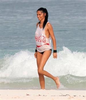 Adriana Lima – beach shoot candids in Cancun 12/2/13 
