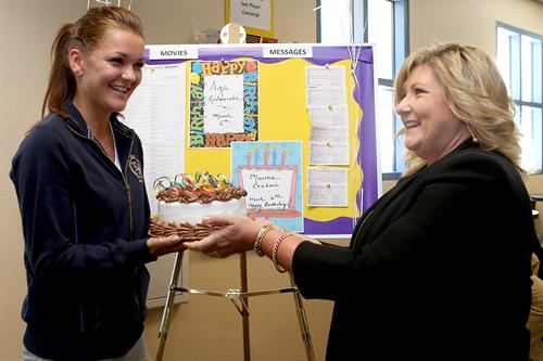 Agnieszka Radwanska is presented a cake for her birthday during the BNP Paribas Open March 6, 2013 