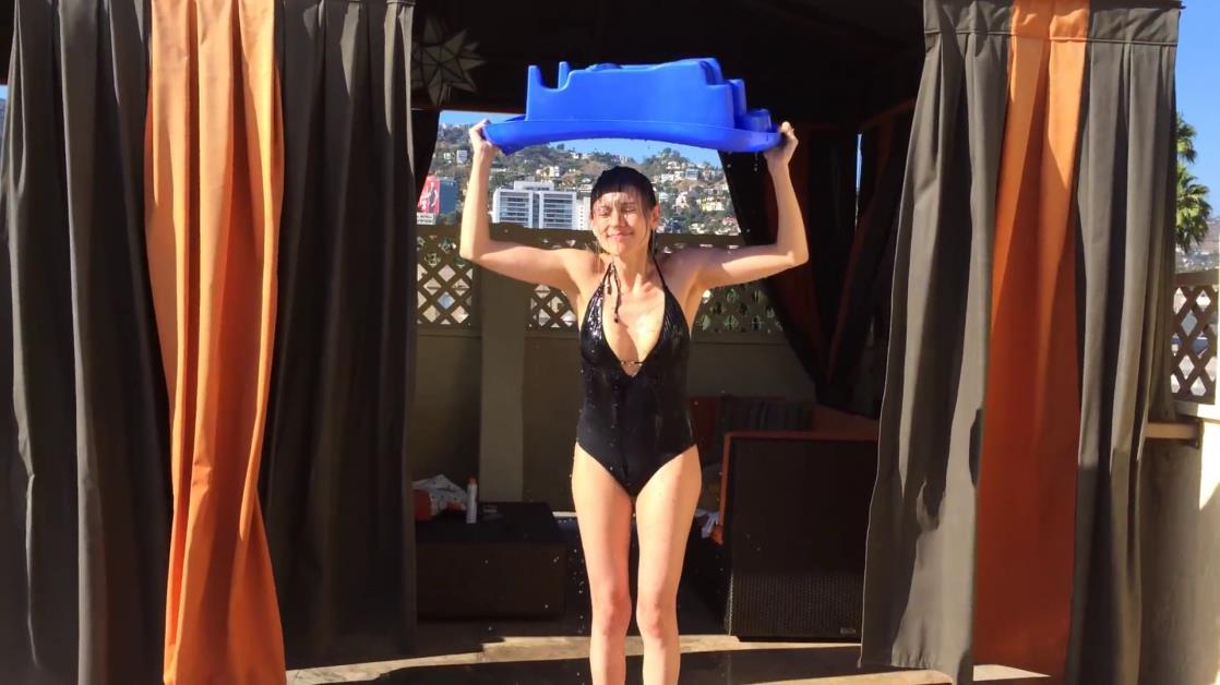 Marie Ange Casalta in a bikini