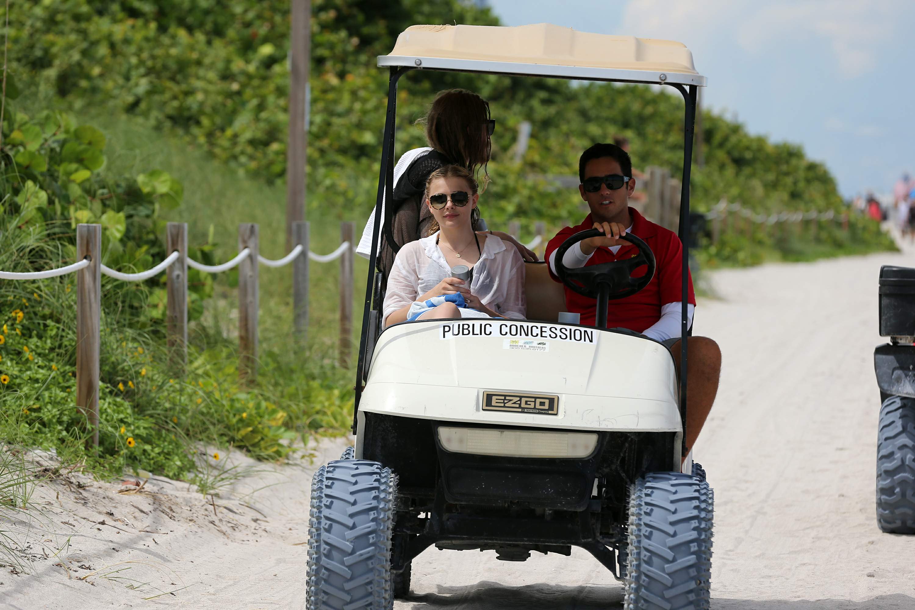 Chloe Grace Moretz candids in a Black Bikini in Miami Beach