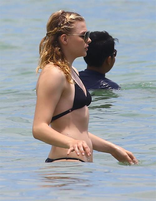 Chloe Grace Moretz candids in a Black Bikini in Miami Beach
