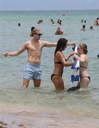 Chloe Grace Moretz candids in a Black Bikini in Miami Beach
