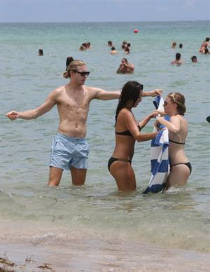 Chloe Grace Moretz candids in a Black Bikini in Miami Beach