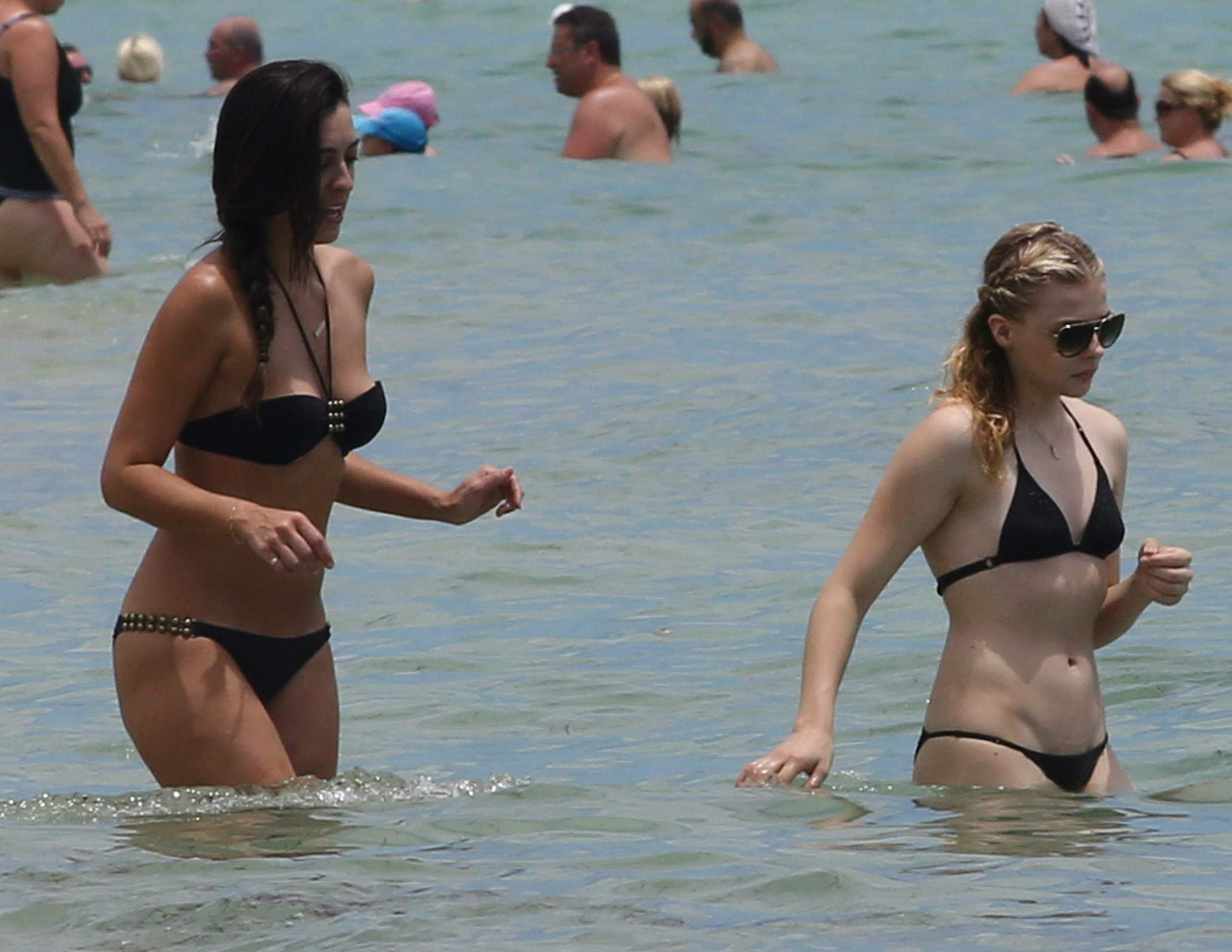 Chloe Grace Moretz candids in a Black Bikini in Miami Beach