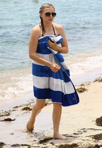 Chloe Grace Moretz candids in a Black Bikini in Miami Beach