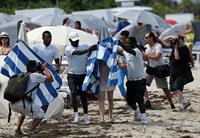 Chloe Grace Moretz candids in a Black Bikini in Miami Beach