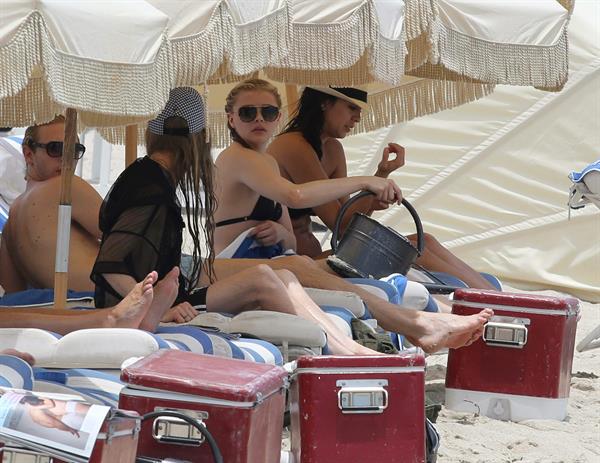 Chloe Grace Moretz candids in a Black Bikini in Miami Beach