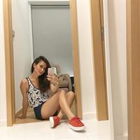 Celina Jade taking a selfie