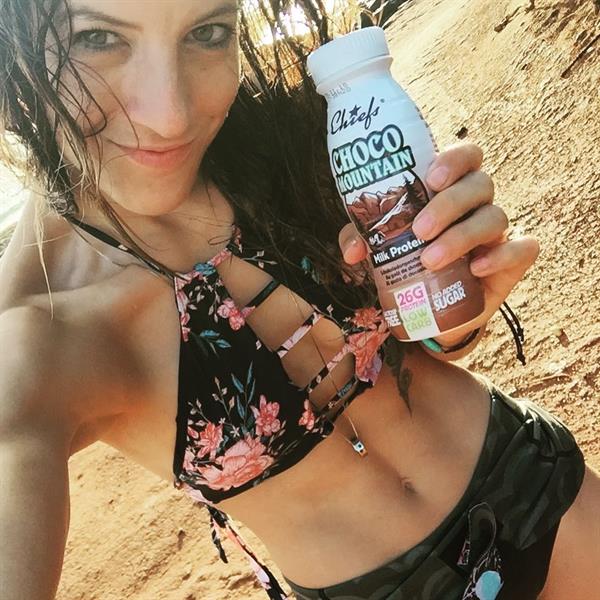 Julia Dujmovits in a bikini taking a selfie