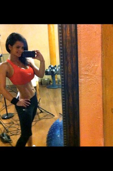 Denise Milani taking a selfie